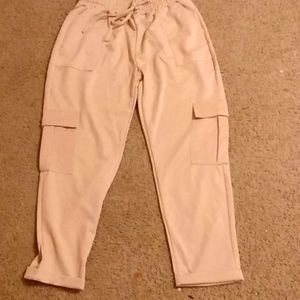 beige colored pants, no specific brand on the pants, size is L/XL